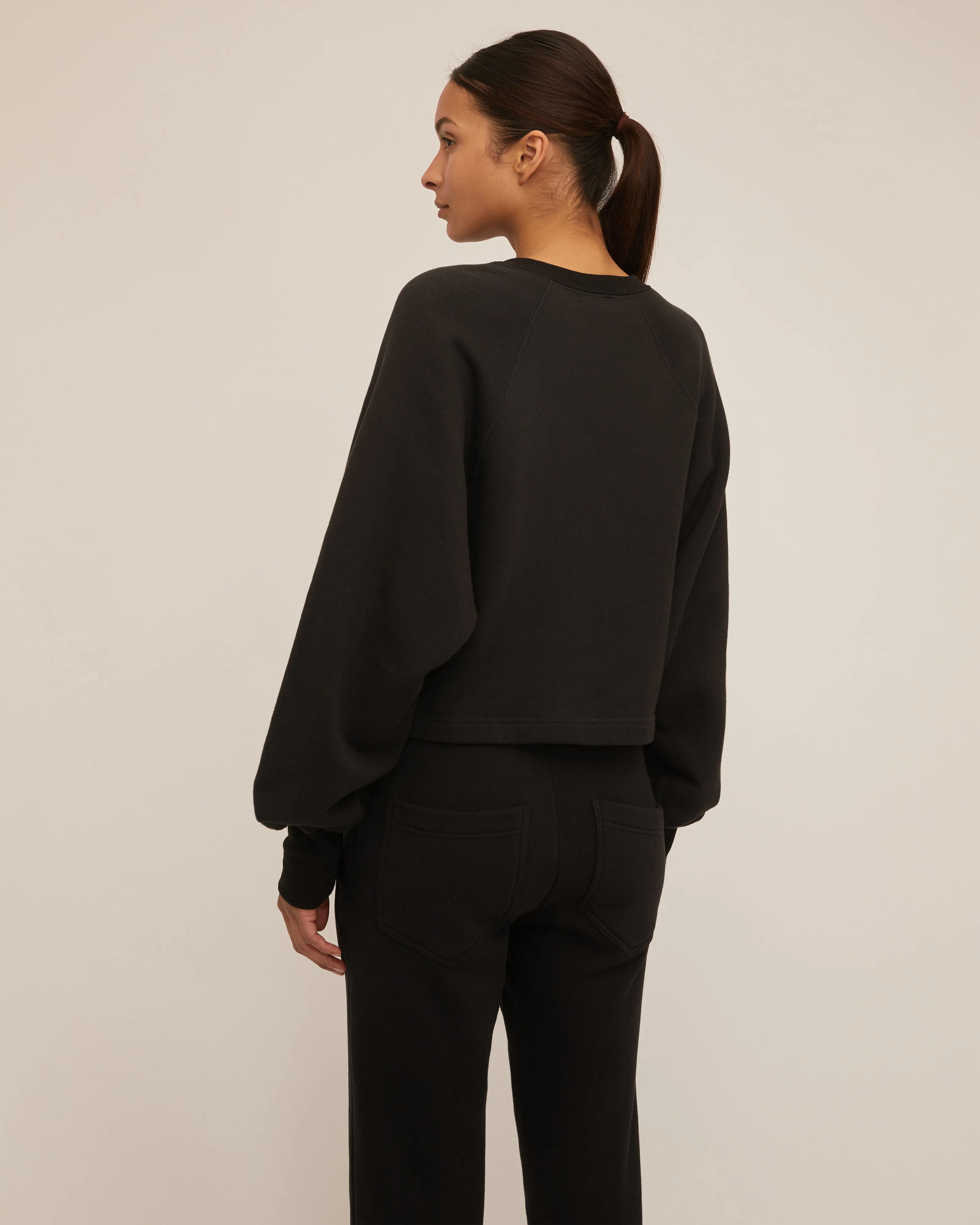 So Uptight French Terry Plunge Henley Sweatshirt in Black